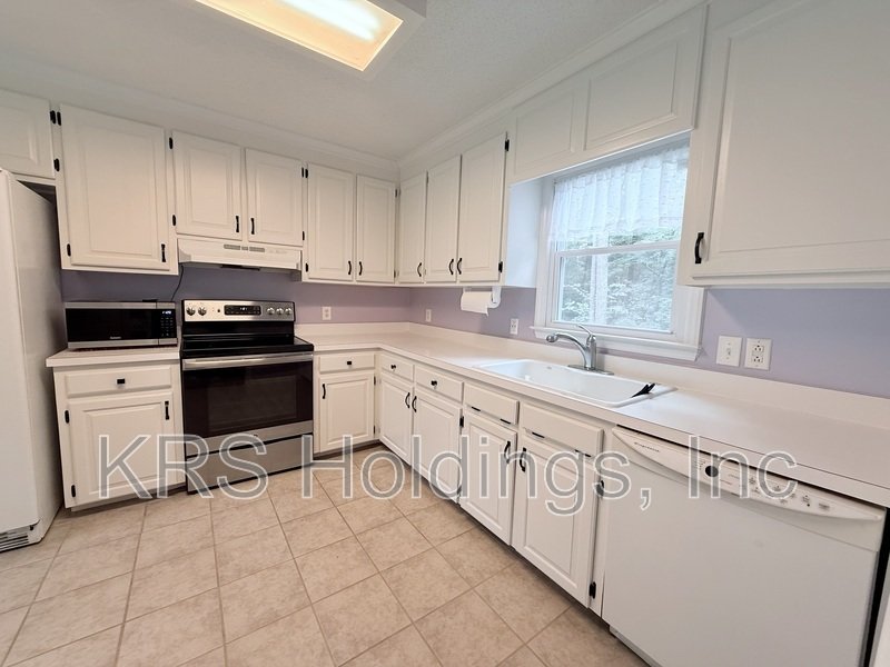 Spacious Fuquay-Varina Home with Huge Fenced Backyard & 2-Car Garage! property image