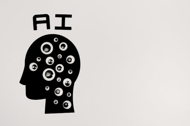 silhouette  of head with word AI spelled above it