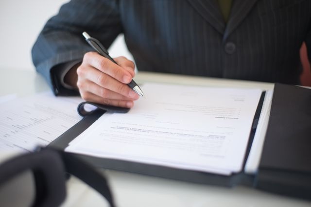 person reading through a document