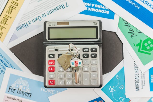 calculator with set of key on top of it